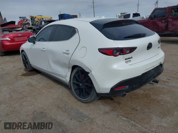 2021 Mazda 3 Premium with VIN JM1BPAML0M1302385, listed as a IAAI auction lot 41397521 with 55,907 mi miles and . Bid and sale history available at DreamBid. Image 3.