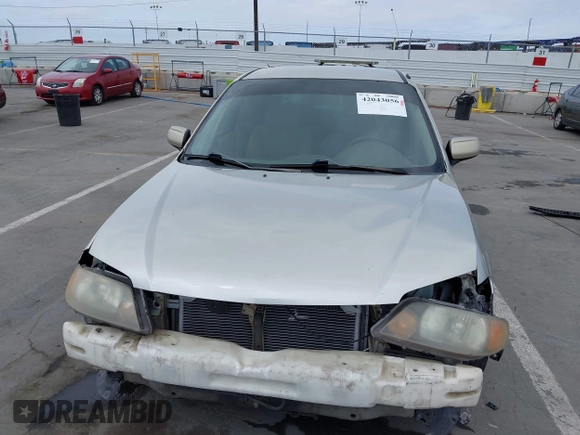2002 Mazda Protege DX with VIN JM1BJ225121620394, listed as a IAAI auction lot 42043056 with 187,360 mi miles and . Bid and sale history available at DreamBid. Image 13.