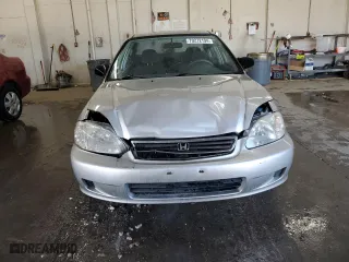 1999 Honda Civic VP with VIN 2HGEJ6617XH594440, listed as a Copart auction lot 70272194 with 200,639 mi miles and Salvage Title. Bid and sale history available at carsss.com. Image 5.