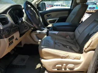 2016 Nissan Titan Platinum Reserve with VIN 1N6BA1F48GN513710, listed as a Copart auction lot 61187715 with 291,548 mi miles and Clean title. Bid and sale history available at DreamBid. Image 7.