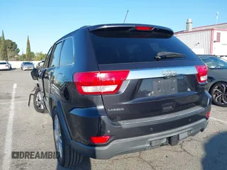 2013 Jeep Grand Cherokee Laredo with VIN 1C4RJEAG2DC643290, listed as a IAAI auction lot 41751696 with 125,258 mi miles. Bid and sale history available at carsss.com. Image 3.