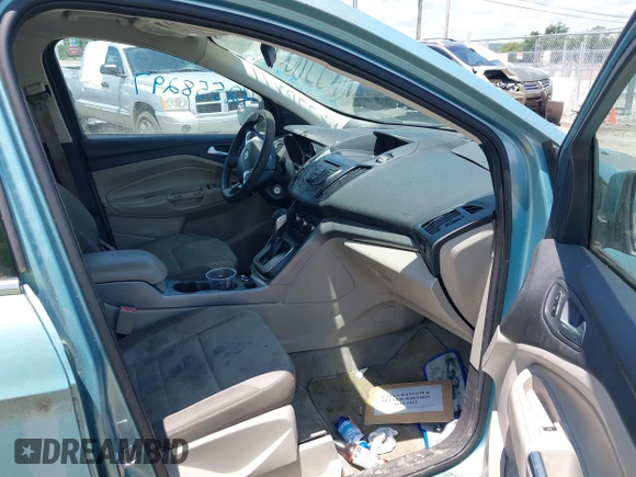 2013 Ford Escape SE z VIN 1FMCU0GX0DUA90717, wystawiony jako IAAI lot #42558297 z przebiegiem 122 785 mil mil oraz . Historia ofert i sprzedaży dostępna na DreamBid. Obrazek 5.