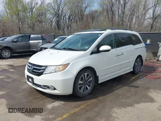 2014 Honda Odyssey Touring с VIN 5FNRL5H94EB057681, выставлен на аукционе IAAI как лот 41828000 с пробегом 249 350 миль миль и . История ставок и продаж доступна на DreamBid. Изображение 18.