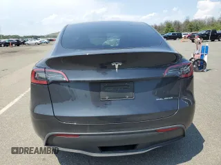 2024 Tesla Model Y Long Range с VIN 7SAYGDEE7RF180945, выставлен на аукционе Copart как лот 62059735 с пробегом Не указан миль и Списание • Salvage title. История ставок и продаж доступна на DreamBid. Изображение 6.