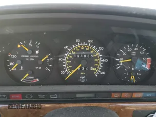1990 Mercedes-Benz 560 with VIN WDBCA39EXLA503543, listed as a Copart auction lot 83086254 with 195,635 mi miles and Clean Title. Bid and sale history available at DreamBid. Image 9.