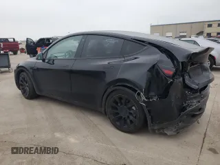 2022 Tesla Model Y Long Range with VIN 7SAYGAEE1NF381491, listed as a Copart auction lot 52694185 with 33,412 mi miles and Salvage Title. Bid and sale history available at DreamBid. Image 2.