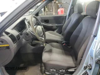 2005 Hyundai Accent GLS with VIN KMHCG45C15U602419, listed as a Copart auction lot 47759675 with 58,133 mi miles and Salvage Title. Bid and sale history available at carsss.com. Image 7.