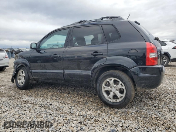 2009 Hyundai Tucson SE with VIN KM8JN72D49U975875, listed as a Copart auction lot 76923954 with 167,155 mi miles and Salvage Title. Bid and sale history available at carsss.com. Image 2.