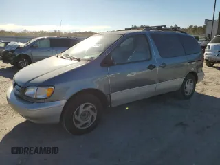 2000 Toyota Sienna LE with VIN 4T3ZF13C2YU281355, listed as a Copart auction lot 76415954 with 133,763 mi miles and Salvage Title. Bid and sale history available at carsss.com. Image 1.