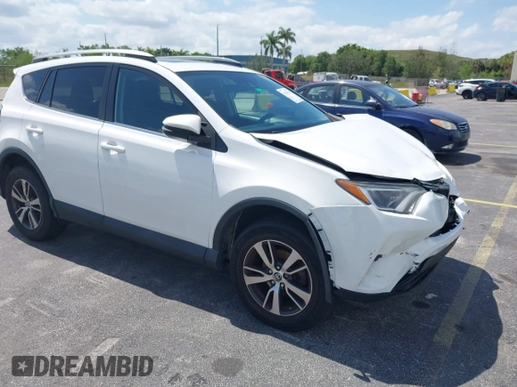 2018 Toyota RAV4 XLE with VIN 2T3WFREV9JW490324, listed as a IAAI auction lot 42298261 with 167,727 mi miles and . Bid and sale history available at DreamBid. Image 1.