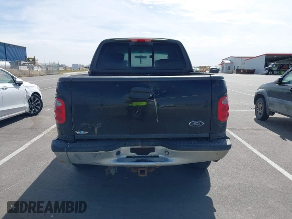 2003 Ford F-150 XLT with VIN 1FTRW08L83KA14760, listed as a IAAI auction lot 41820943 with 215,130 mi miles. Bid and sale history available at carsss.com. Image 16.