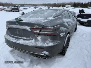 2020 Nissan Maxima SL с VIN 1N4AA6DV1LC380260, выставлен на аукционе Copart как лот 43796625 с пробегом 204 539 миль миль и Списание • Salvage title. История ставок и продаж доступна на DreamBid. Изображение 3.