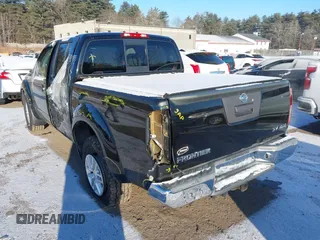 2018 Nissan Frontier SV with VIN 1N6AD0EV0JN718047, listed as a IAAI auction lot 41310302 with 103,488 mi miles and . Bid and sale history available at DreamBid. Image 3.