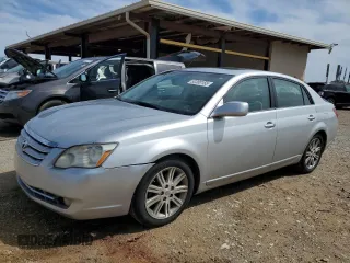 2007 Toyota Avalon XL z VIN 4T1BK36B77U215158, wystawiony jako Copart lot #50380155 z przebiegiem 217 523 mil mil oraz Szkoda całkowita • Salvage title. Historia ofert i sprzedaży dostępna na DreamBid. Obrazek 1.
