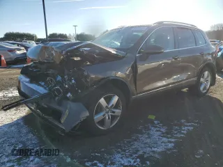 2013 Volkswagen Touareg Sport с VIN WVGEP9BP5DD003924, выставлен на аукционе Copart как лот 83310484 с пробегом Не указан миль и Списание • Salvage title. История ставок и продаж доступна на DreamBid. Изображение 1.