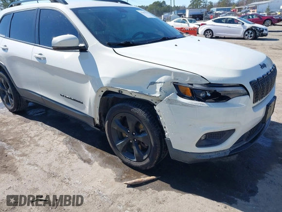 2019 Jeep Cherokee Latitude Plus with VIN 1C4PJLLB2KD296144, listed as a IAAI auction lot 41681051 with 199,698 mi miles and . Bid and sale history available at DreamBid. Image 6.