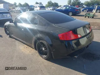 2005 Infiniti G35 Coupe with VIN JNKCV54E85M409346, listed as a IAAI auction lot 42000205 with 164,097 mi miles. Bid and sale history available at carsss.com. Image 3.