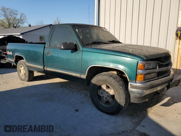 1995 Chevrolet Silverado 1500 with VIN 1GCEK14KXSZ256694, listed as a Copart auction lot 50697995 with Not Provided miles and Salvage Title. Bid and sale history available at DreamBid. Image 4.