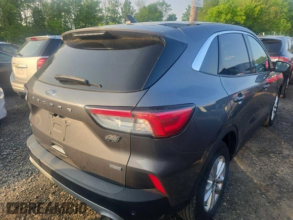 2021 Ford Escape SE Hybrid z VIN 1FMCU0BZ3MUA54870, wystawiony jako IAAI lot #42510106 z przebiegiem 36 098 mil mil oraz . Historia ofert i sprzedaży dostępna na DreamBid. Obrazek 2.