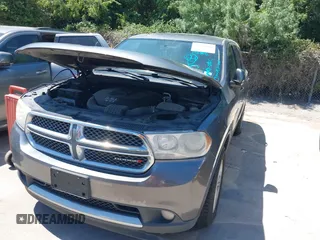 2013 Dodge Durango SXT z VIN 1C4RDHAG4DC512046, wystawiony jako IAAI lot #42826019 z przebiegiem 192 308 mil mil oraz . Historia ofert i sprzedaży dostępna na DreamBid. Obrazek 6.