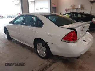 2013 Chevrolet Impala LT with VIN 2G1WB5E31D1164929, listed as a IAAI auction lot 42091934 with 67,218 mi miles and . Bid and sale history available at DreamBid. Image 3.