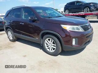 2015 Kia Sorento LX z VIN 5XYKTDA65FG569987, wystawiony jako IAAI lot #42595316 z przebiegiem 206 061 mil mil oraz . Historia ofert i sprzedaży dostępna na DreamBid. Obrazek 1.