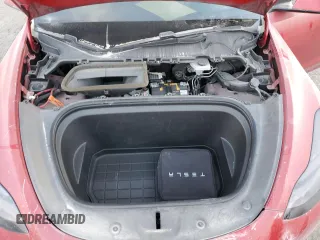 2020 Tesla Model Y Long Range z VIN 5YJYGDEE3LF011297, wystawiony jako Copart lot #42711345 z przebiegiem 103 803 mil mil oraz Szkoda całkowita • Salvage title. Historia ofert i sprzedaży dostępna na DreamBid. Obrazek 12.