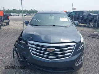 2019 Cadillac XT5 FWD with VIN 1GYKNARS6KZ176080, listed as a IAAI auction lot 42441084 with 46,931 mi miles and . Bid and sale history available at DreamBid. Image 13.