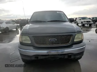 2003 Ford F-150 XL z VIN 1FTRF17263NA29013, wystawiony jako Copart lot #55668355 z przebiegiem 202 416 mil mil oraz Szkoda całkowita • Salvage title. Historia ofert i sprzedaży dostępna na DreamBid. Obrazek 5.