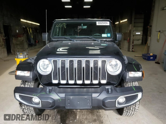 2022 Jeep Wrangler Unlimited Sahara Altitude with VIN 1C4HJXEG0NW115877, listed as a Copart auction lot 80689494 with 30,928 mi miles and Salvage title. Bid and sale history available at DreamBid. Image 5.