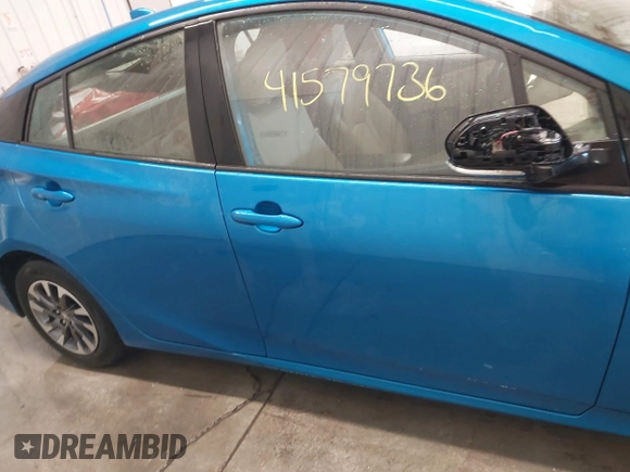 2021 Toyota Prius L Eco with VIN JTDKAMFU9M3135117, listed as a IAAI auction lot 41579736 with 35,795 mi miles and . Bid and sale history available at DreamBid. Image 14.