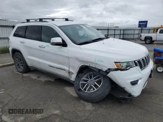 2019 Jeep Grand Cherokee Limited with VIN 1C4RJFBG9KC723851, listed as a Copart auction lot 49499335 with 54,617 mi miles and Salvage Title. Bid and sale history available at carsss.com. Image 4.