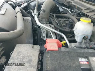 2021 Ram 1500 Tradesman z VIN 1C6RR6FT0MS515437, wystawiony jako IAAI lot #42059532 z przebiegiem 92 741 mil mil oraz . Historia ofert i sprzedaży dostępna na DreamBid. Obrazek 19.