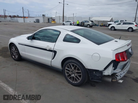2012 Ford Mustang Premium with VIN 1ZVBP8AM6C5234877, listed as a IAAI auction lot 41911274 with 119,512 mi miles and . Bid and sale history available at DreamBid. Image 3.