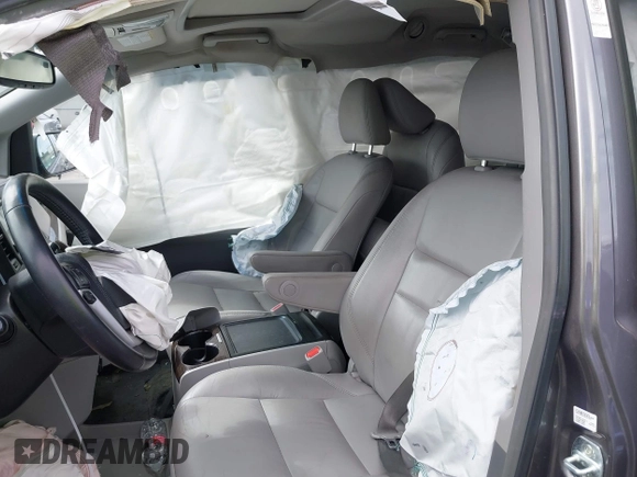 2015 Toyota Sienna XLE with VIN 5TDYK3DC6FS660410, listed as a IAAI auction lot 41801496 with 81,755 mi miles. Bid and sale history available at carsss.com. Image 19.