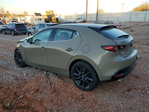 2024 Mazda Mazda3 Hatchback 2.5 Carbon Turbo with VIN JM1BPBYY5R1706527, listed as a Copart auction lot 82852524 with 5,750 mi miles and Salvage Title. Bid and sale history available at carsss.com. Image 2.