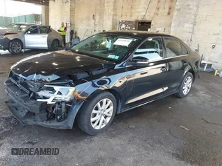 2014 Volkswagen Jetta SE with VIN 3VWD17AJ7EM399621, listed as a IAAI auction lot 42529650 with 117,825 mi miles and . Bid and sale history available at DreamBid. Image 2.