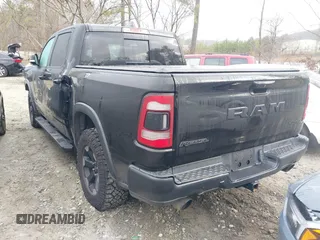 2019 Ram 1500 Rebel with VIN 1C6SRFLTXKN580782, listed as a IAAI auction lot 41498027 with 83,669 mi miles and . Bid and sale history available at DreamBid. Image 3.