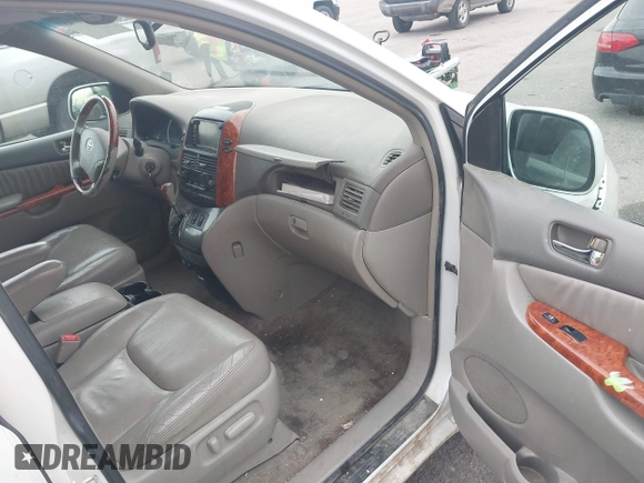 2006 Toyota Sienna XLE z VIN 5TDBA22C86S076919, wystawiony jako IAAI lot #41188745 z przebiegiem 216 468 mil mil oraz . Historia ofert i sprzedaży dostępna na DreamBid. Obrazek 5.