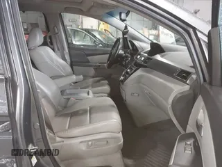 2012 Honda Odyssey EX-L with VIN 5FNRL5H63CB137198, listed as a IAAI auction lot 42706690 with 305,753 mi miles and . Bid and sale history available at DreamBid. Image 5.