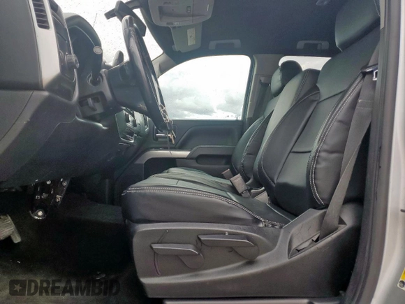 2018 Chevrolet Silverado 1500 LT with VIN 1GCRCREC4JZ152687, listed as a Copart auction lot 56694055 with 116,397 mi miles and Clean Title. Bid and sale history available at DreamBid. Image 7.
