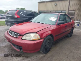1997 Honda Civic LX with VIN 1HGEJ6672VL019621, listed as a IAAI auction lot 42081226 with 194,957 mi miles. Bid and sale history available at carsss.com. Image 2.