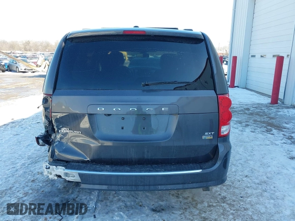 2019 Dodge Grand Caravan SXT with VIN 2C4RDGCG9KR637121, listed as a IAAI auction lot 41636355 with 177,073 mi miles and . Bid and sale history available at DreamBid. Image 17.