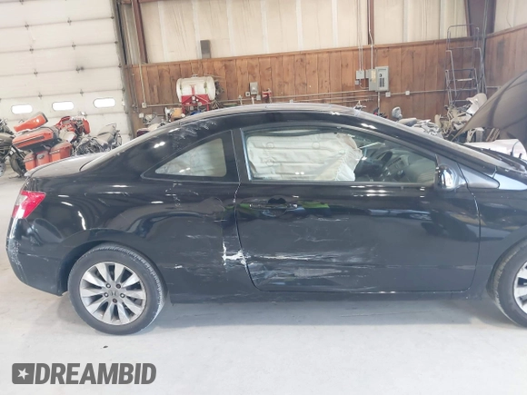 2010 Honda Civic Cpe EX with VIN 2HGFG1B84AH534969, listed as a IAAI auction lot 42067211 with 85,919 mi miles. Bid and sale history available at carsss.com. Image 6.