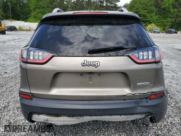 2019 Jeep Cherokee Latitude z VIN 1C4PJLCX5KD148002, wystawiony jako Copart lot #54170595 z przebiegiem 136 852 mil mil oraz Szkoda całkowita • Salvage title. Historia ofert i sprzedaży dostępna na DreamBid. Obrazek 6.