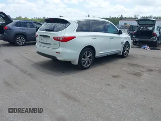 2013 Infiniti JX35 with VIN 5N1AL0MN3DC315618, listed as a IAAI auction lot 42107516 with 178,518 mi miles and . Bid and sale history available at DreamBid. Image 4.