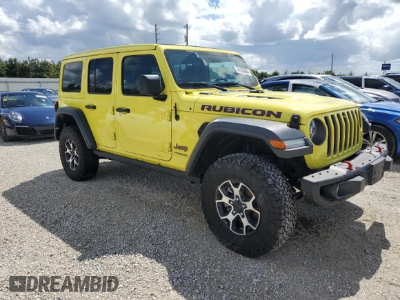2022 Jeep Wrangler Unlimited Rubicon with VIN 1C4HJXFG3NW214174, listed as a Copart auction lot 74136484 with 5,292 mi miles and Salvage title. Bid and sale history available at DreamBid. Image 4.