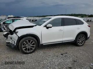 2018 Mazda CX-9 Signature with VIN JM3TCBEY8J0205427, listed as a Copart auction lot 55131585 with 123,812 mi miles and Salvage title. Bid and sale history available at DreamBid. Image 1.