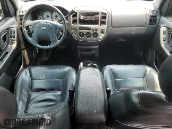 2004 Ford Escape Limited with VIN 1FMCU04164KB51256, listed as a Copart auction lot 58969565 with 137,360 mi miles and Salvage title. Bid and sale history available at DreamBid. Image 8.