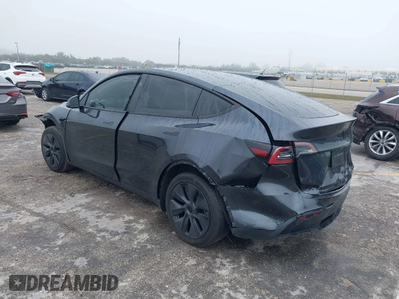 2024 Tesla Model Y with VIN 7SAYGDED8RF213927, listed as a IAAI auction lot 41386687 with 3,599 mi miles and . Bid and sale history available at DreamBid. Image 3.
